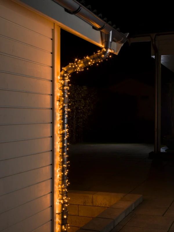 Konstsmide Micro LED Lichtsnoer Lichtketting | 1.2W Extra Warmwit 24V | 20 Lichtpunten | 16cm spacing | 3.04m zwart snoer, 10m aansluitsnoer, buitentrafo