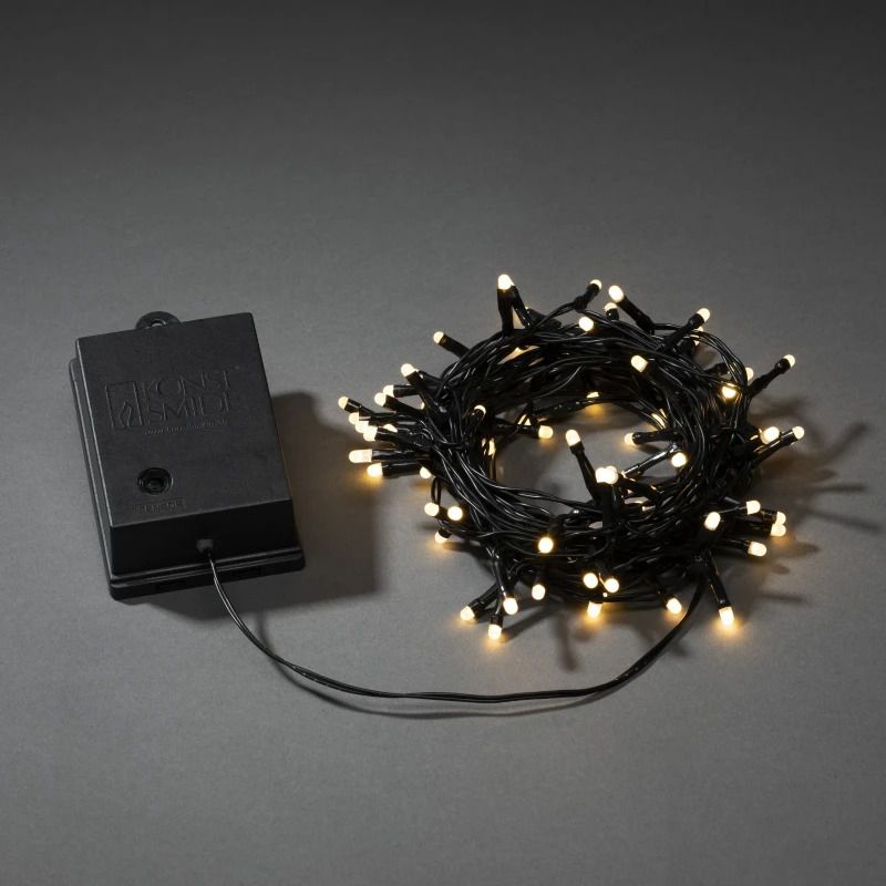 Konstsmide LED Lichtketting | 80 Lichtpunten Warmwit Frosted | 1,6W 1,5V | 7,9m Timer Lichtsensor Batterij Buiten | 50cm aansluitsnoer