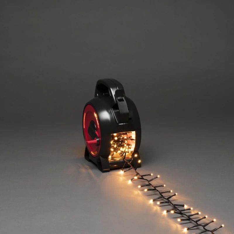Konstsmide Micro LED Lichtketting | 4,5W 300 Lichtpunten Extra Warm Wit | 30V | 6,58m | Zwarte kabel | Buitengebruik | Gepatenteerde kabeloproller