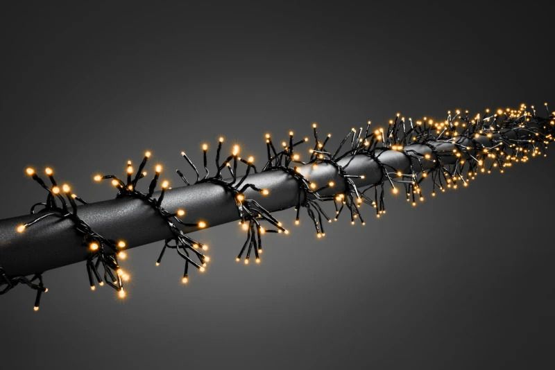 Konstsmide Micro LED Clustersnoer | 4.3m 5.76W 36V | 8 standen, geheugenfunctie | Zwarte kabel, 5m aansluitsnoer | Geschikt voor buiten