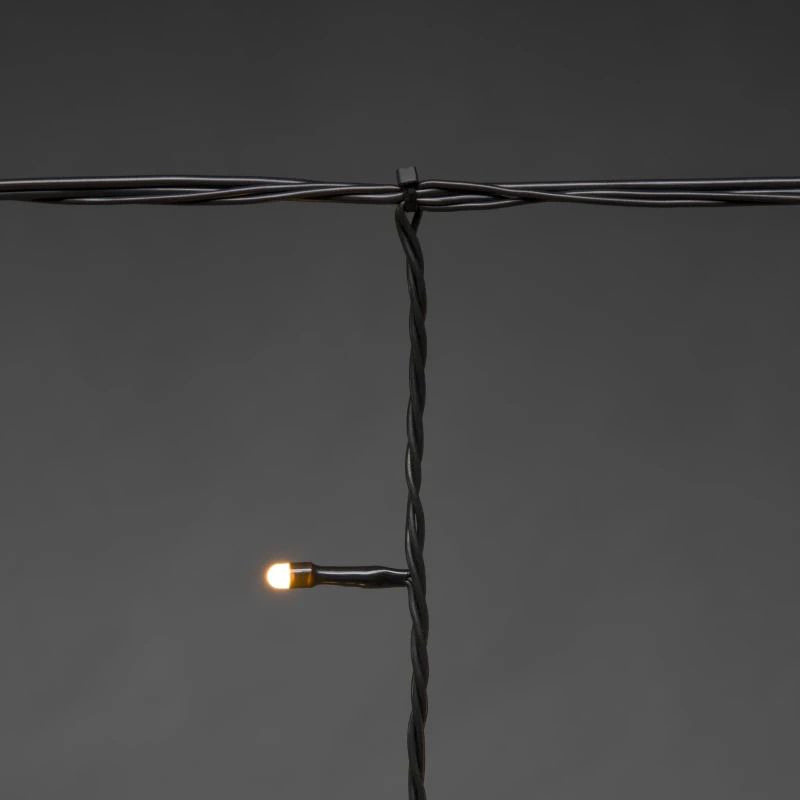 Konstsmide LED Icicle Lichtsnoer | 2,5m 100 Lichtpunten Frosted Extra Warmwit | 1,3W 31V | Koppelbaar Zwart Voor Buiten