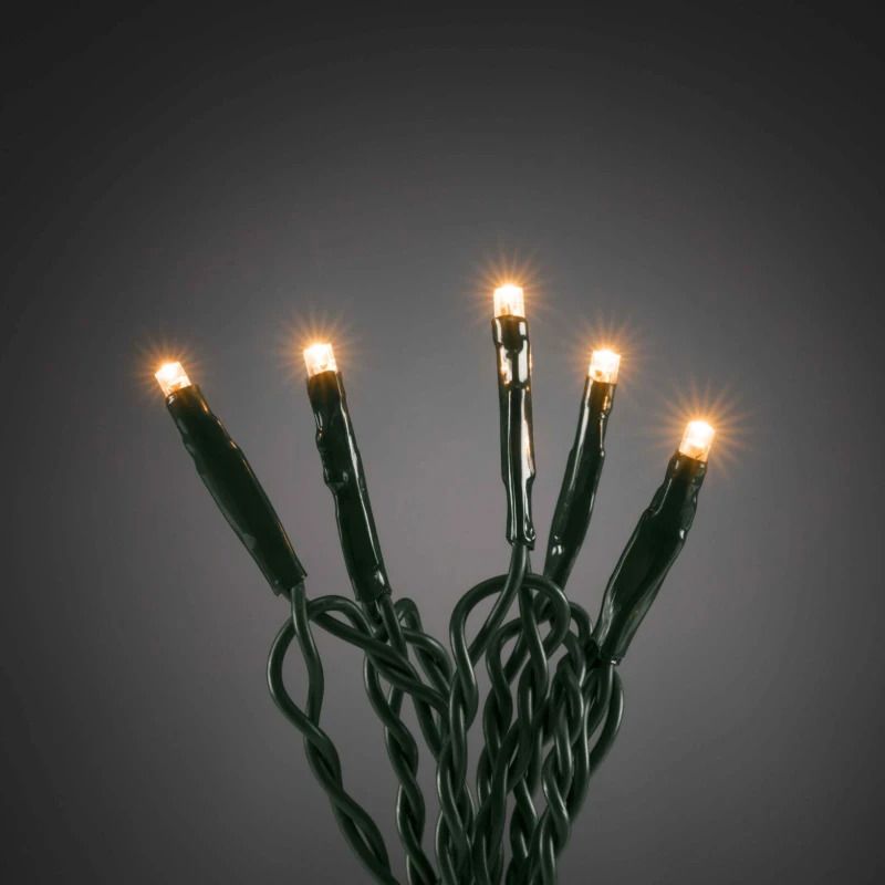 Konstsmide Micro LED Lichtketting | 200 Lichtpunten Extra Warm Wit | 6W 24V | 13,93m | 3m aansluitsnoer, spacing 7cm | Donkergroene kabel, Binnengebruik